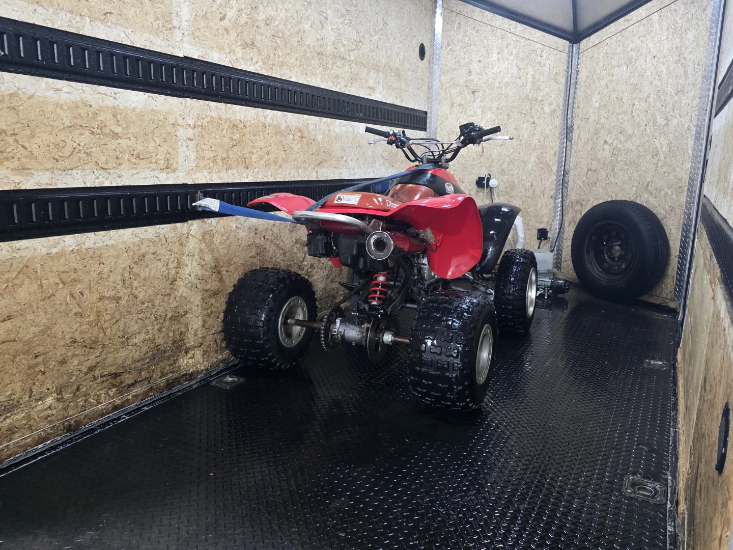 Red and Black ATV Honda 300TRX