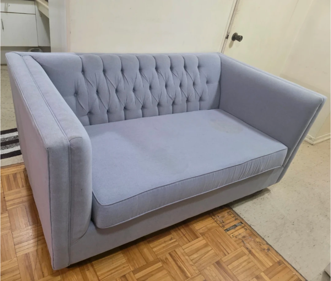 Light Blue Tufted Sofa