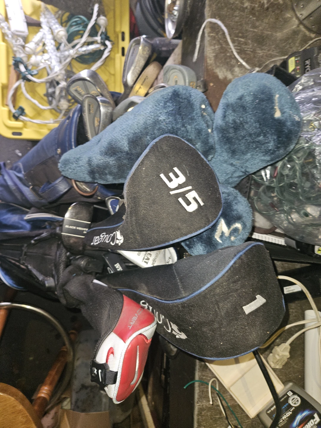 Two Golf Bags with Clubs and Headcovers
