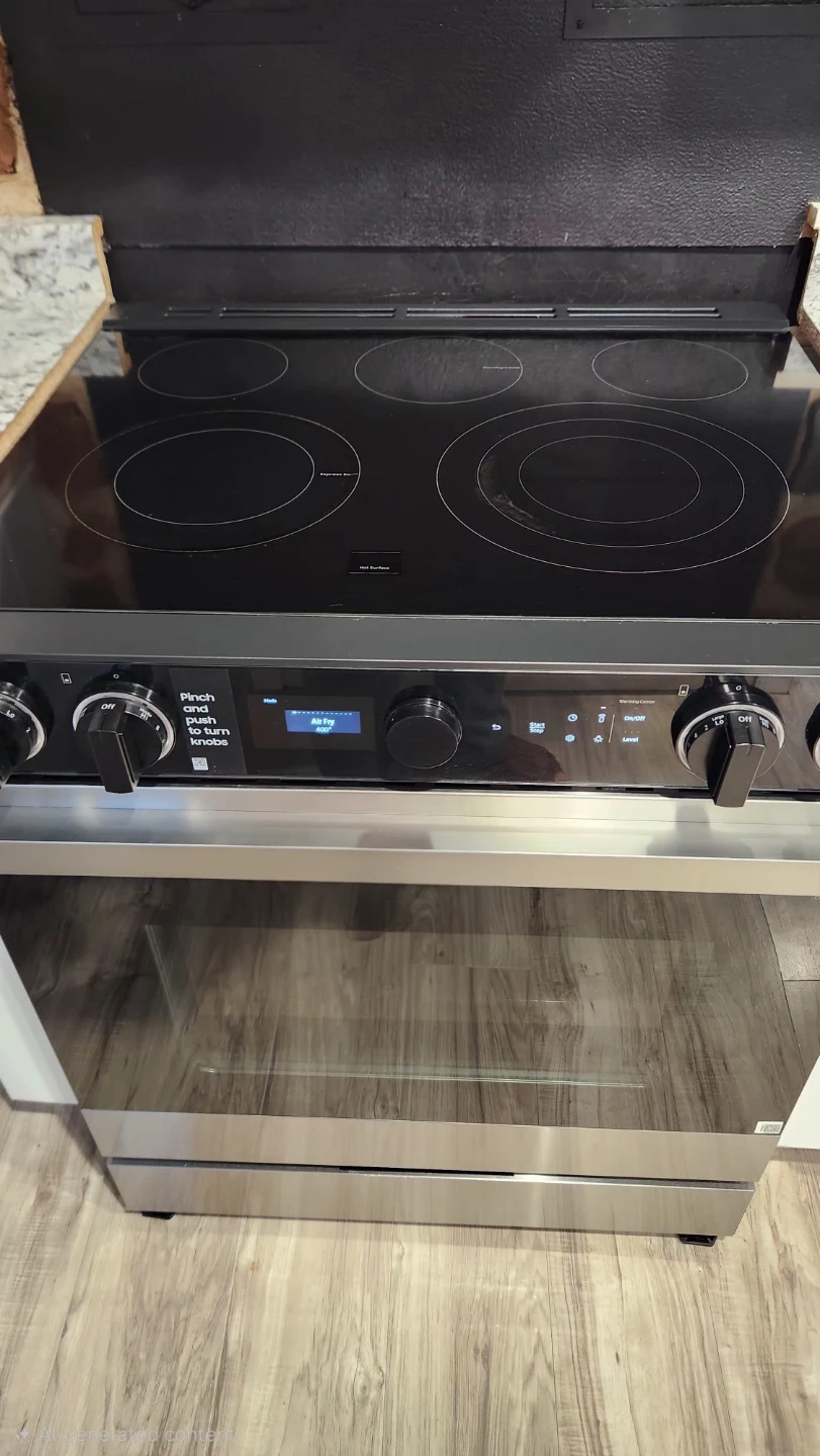 Samsung Stainless Steel Refrigerator & Electric Range with Oven - photo 2