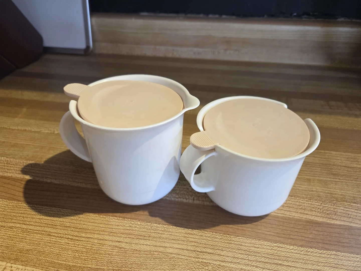 Tupperware cream and sugar containers