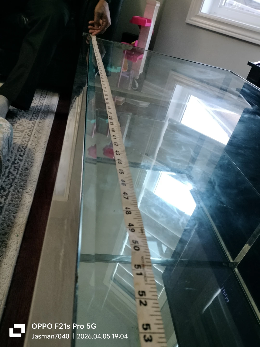 Glass table with a mirror on the bottom