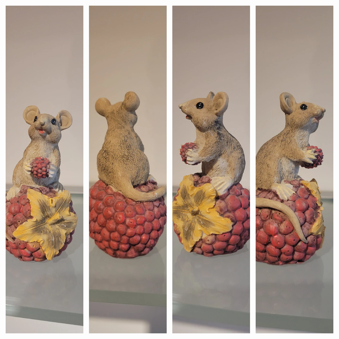 Mouse figurine on raspberry