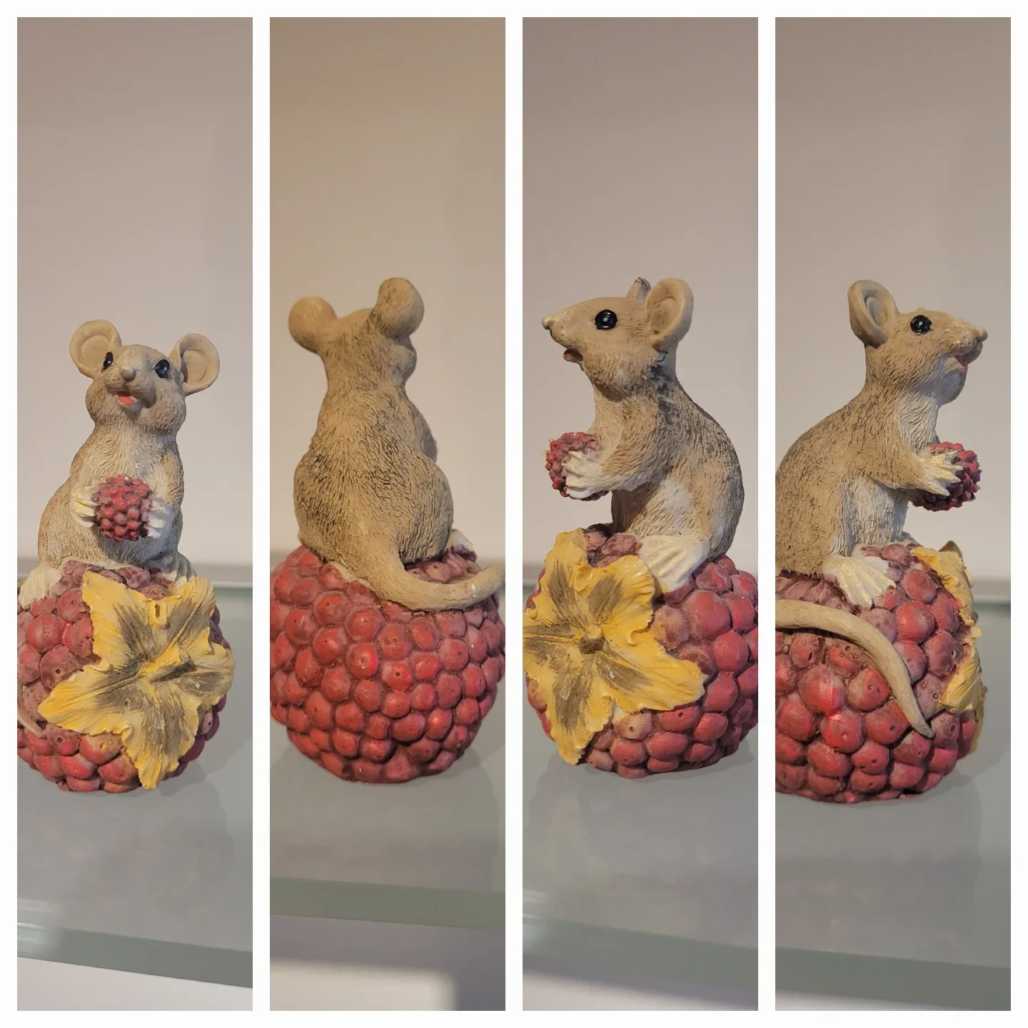 Mouse figurine on raspberry