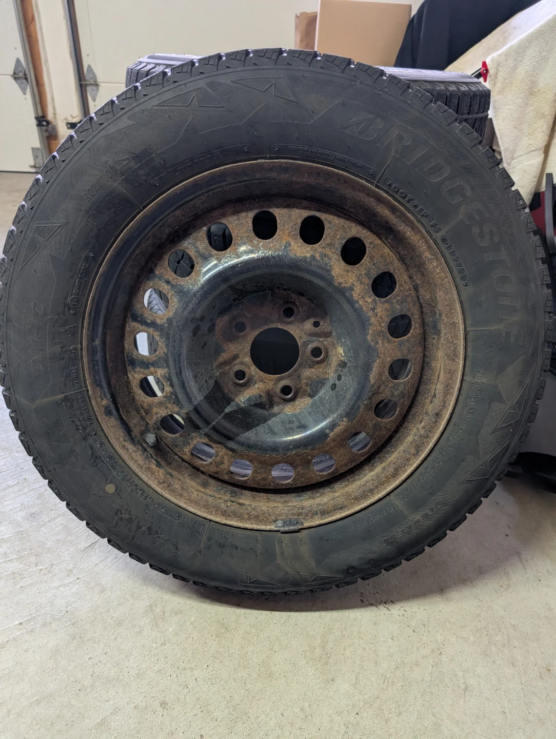 Bridgestone 225/65R17 Winter Tires on Steel Rims