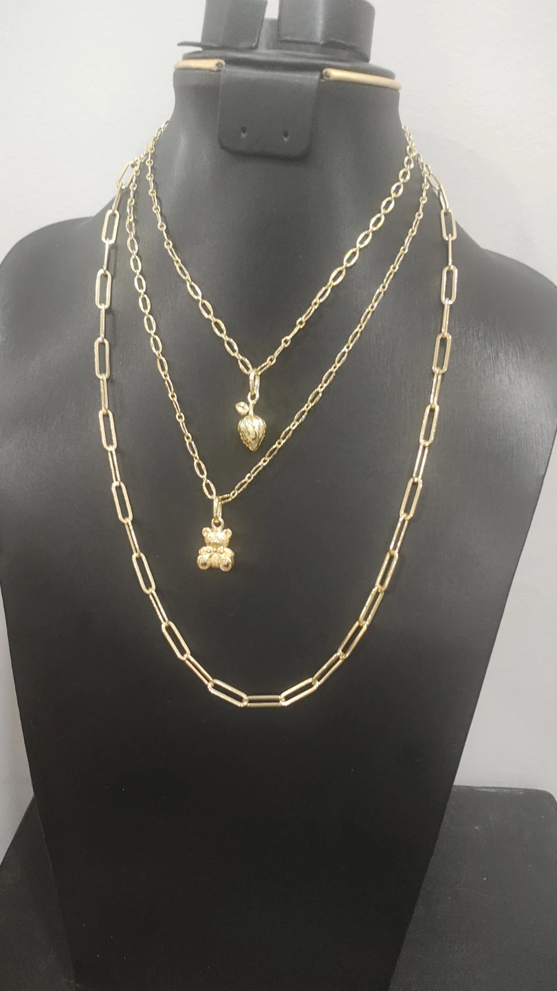 Gold Tone Layered Necklaces with Charms
