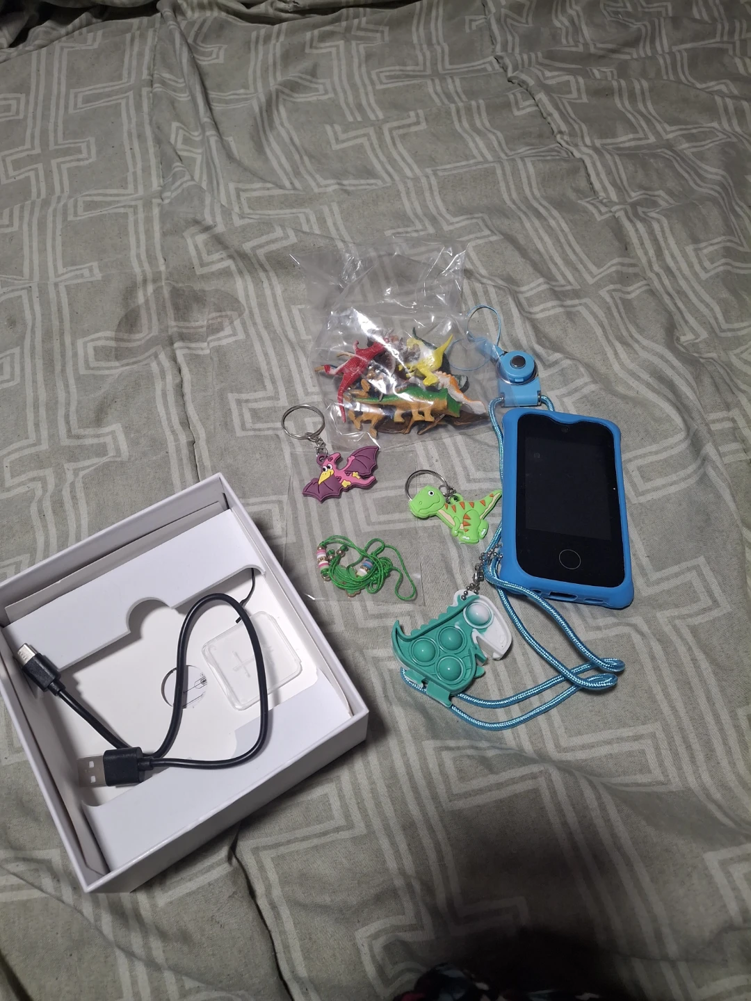 Blue MP3 Player with Dinosaur Pop-It Keychain