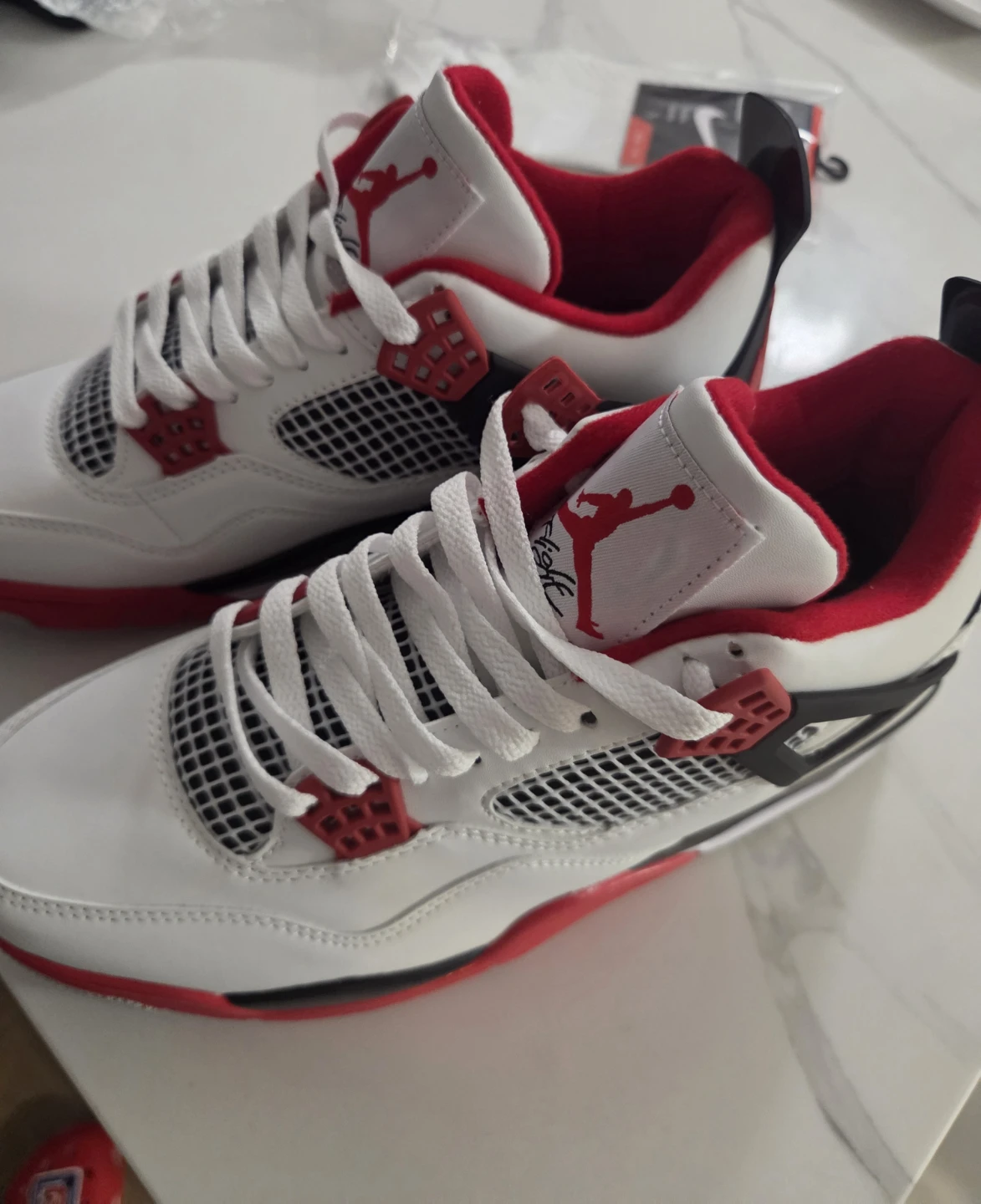 Air Jordan 4 Retro White Red Sneakers