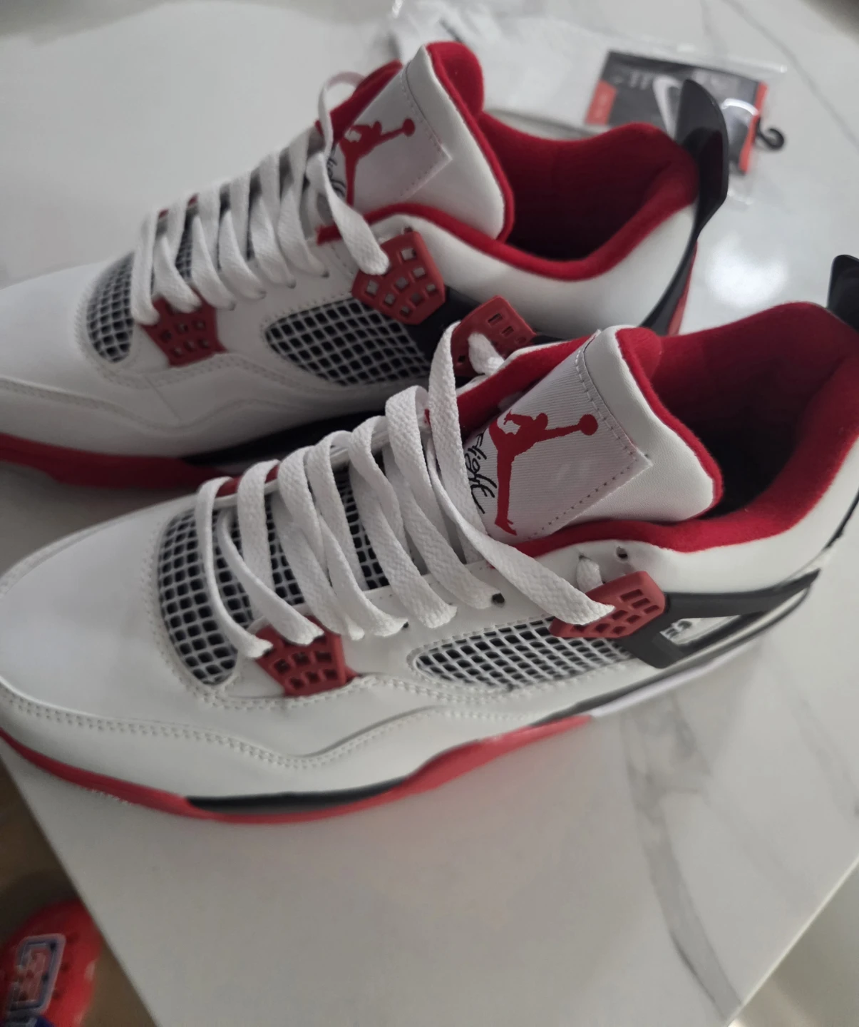 Air Jordan 4 Retro White Red Sneakers - photo 2