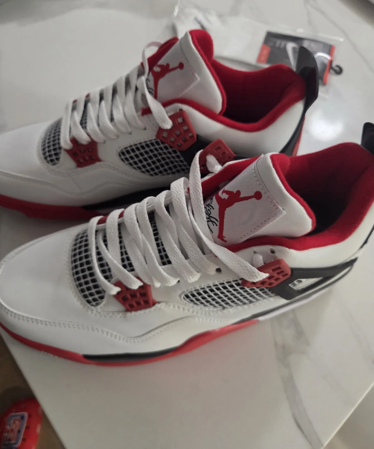 Air Jordan 4 Retro White Red Sneakers - photo 3