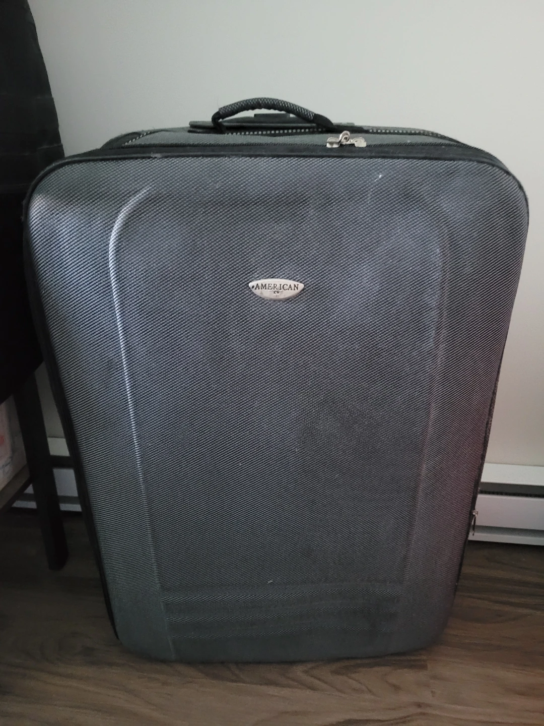 American Tourister Rolling Suitcase