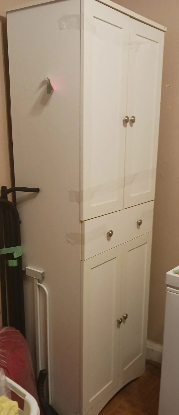 White storage cabinet with doors and drawers