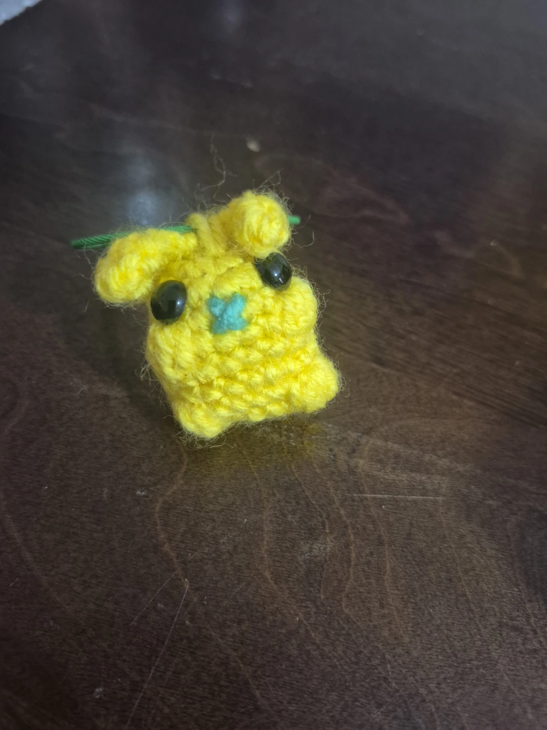 Hand-knitted yellow character keychain