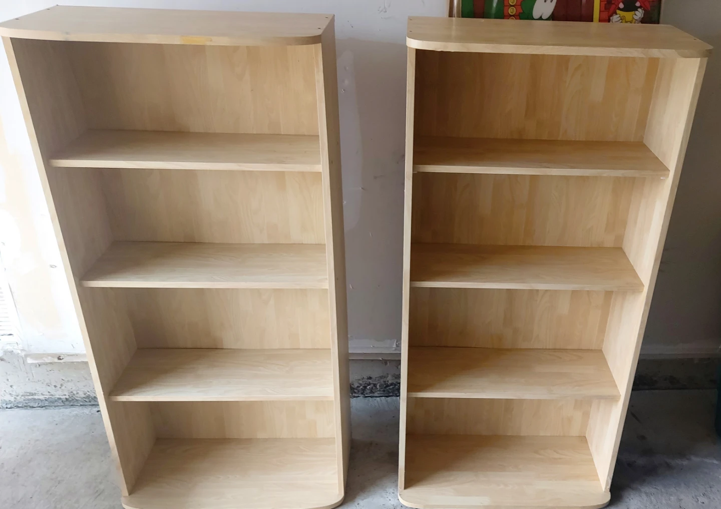 Two light wood 3-shelf bookcases