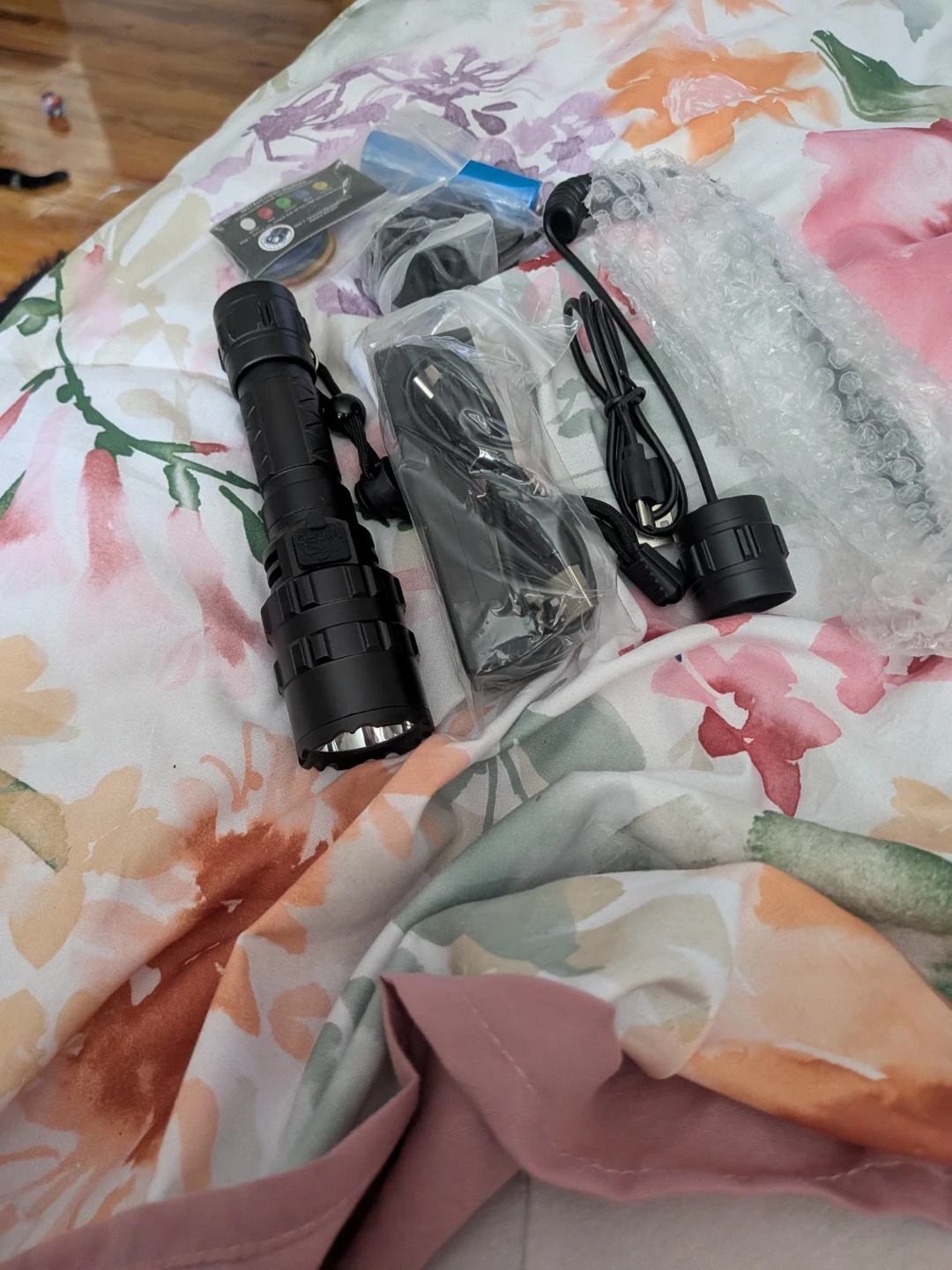 Black LED Flashlight with USB Charging Cable and Accessories