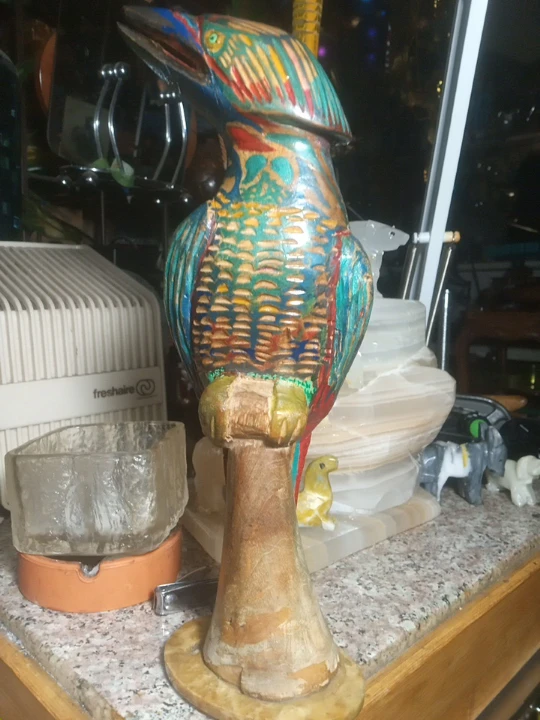 Hand-carved wooden bird sculpture