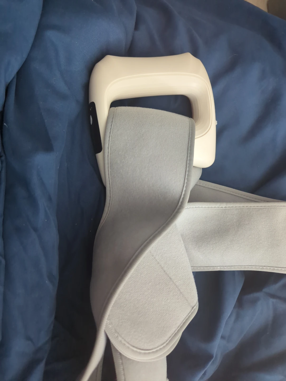 White Portable Massager with Grey Strap