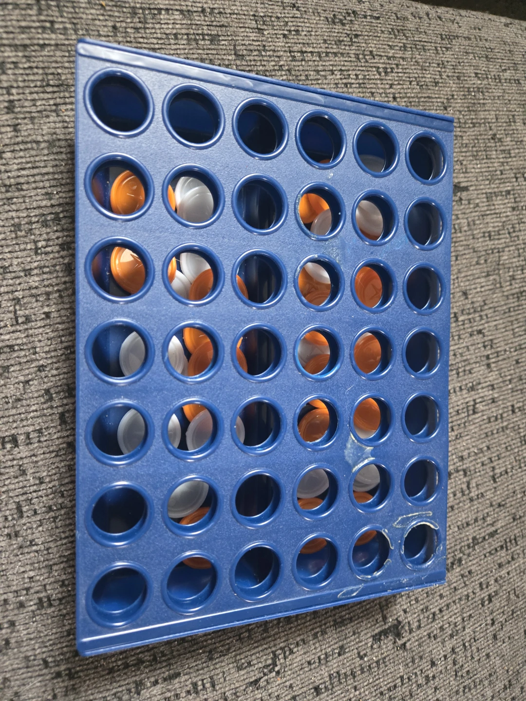Blue Connect 4 Game Board with Orange and White Chips