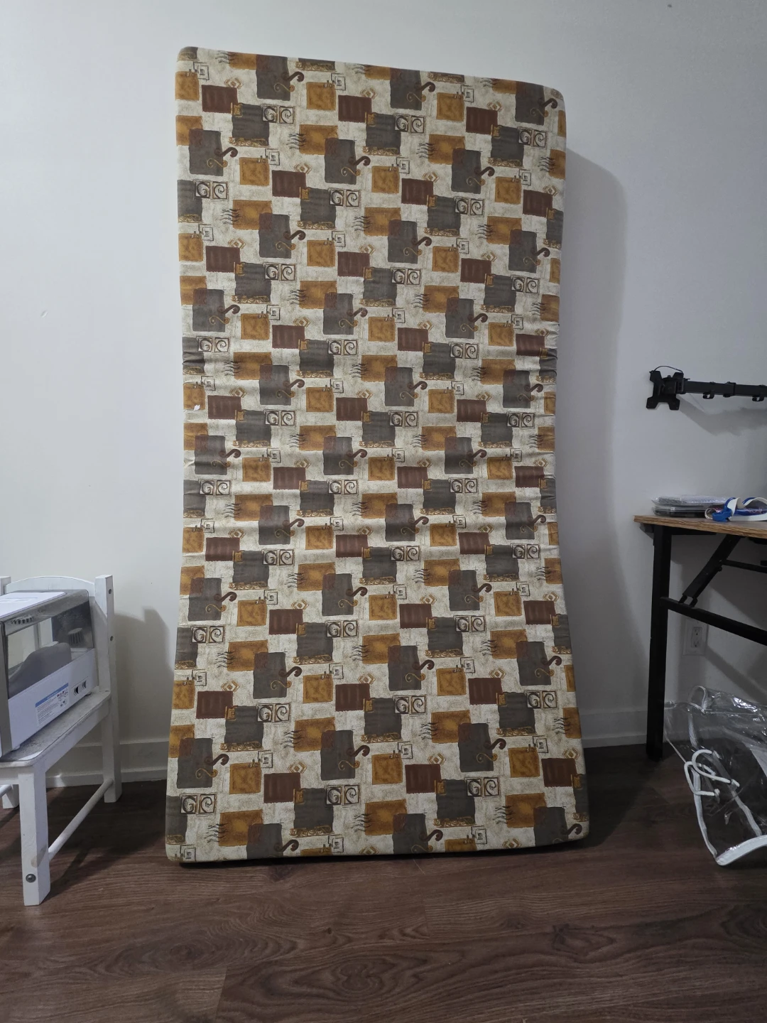 Mattress with brown and beige geometric pattern