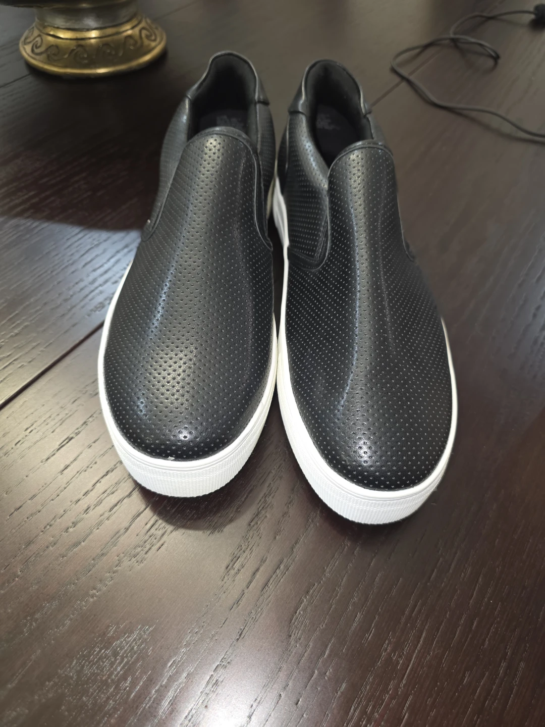 Black perforated slip-on sneakers women's