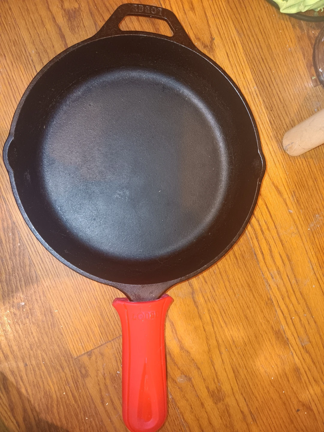 Lodge Cast Iron Skillet with Red Handle Holder