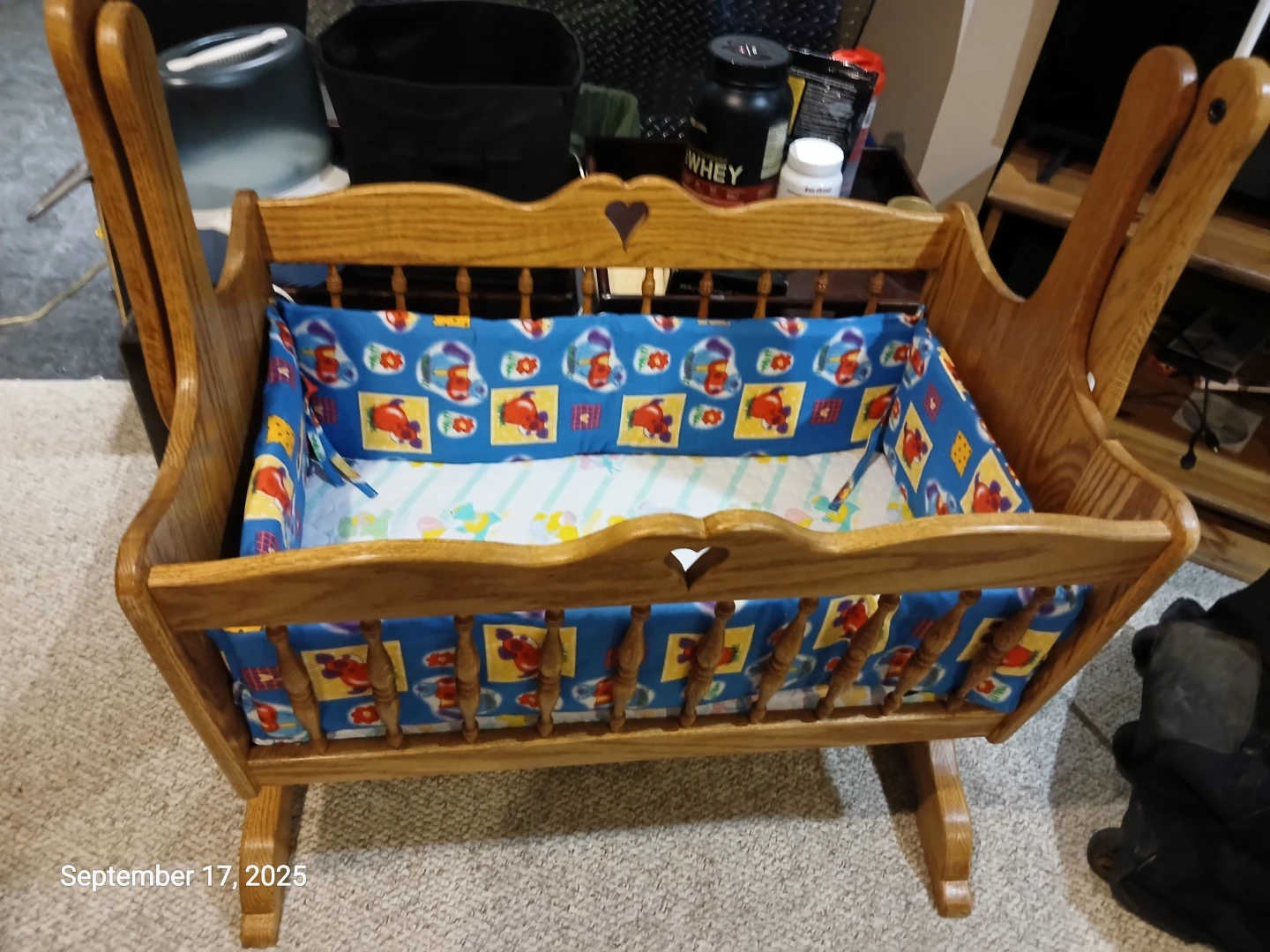 Wooden Cradle Rocker with Blue Animal Print Liner
