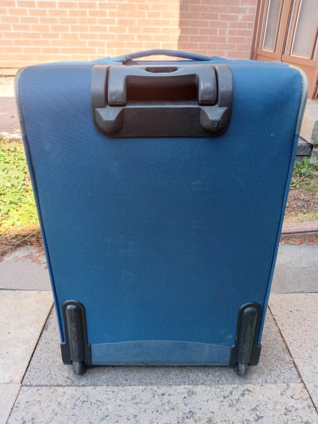 Blue soft-shell rolling suitcase - photo 4