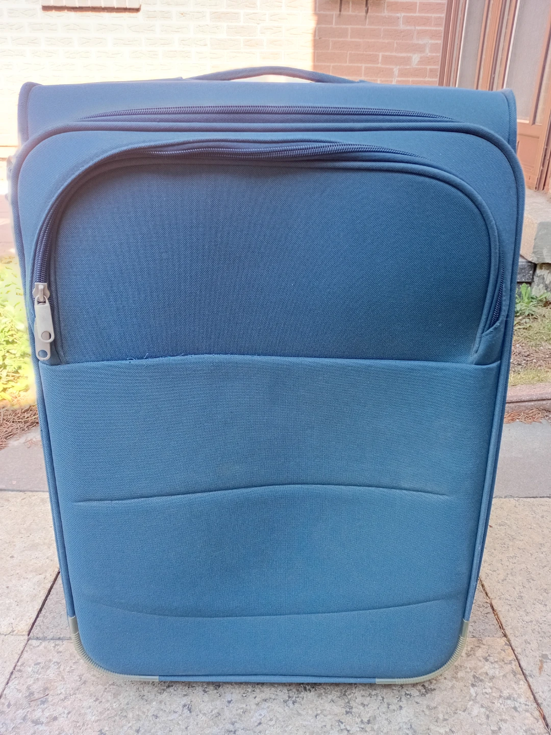 Blue soft-shell rolling suitcase - photo 5
