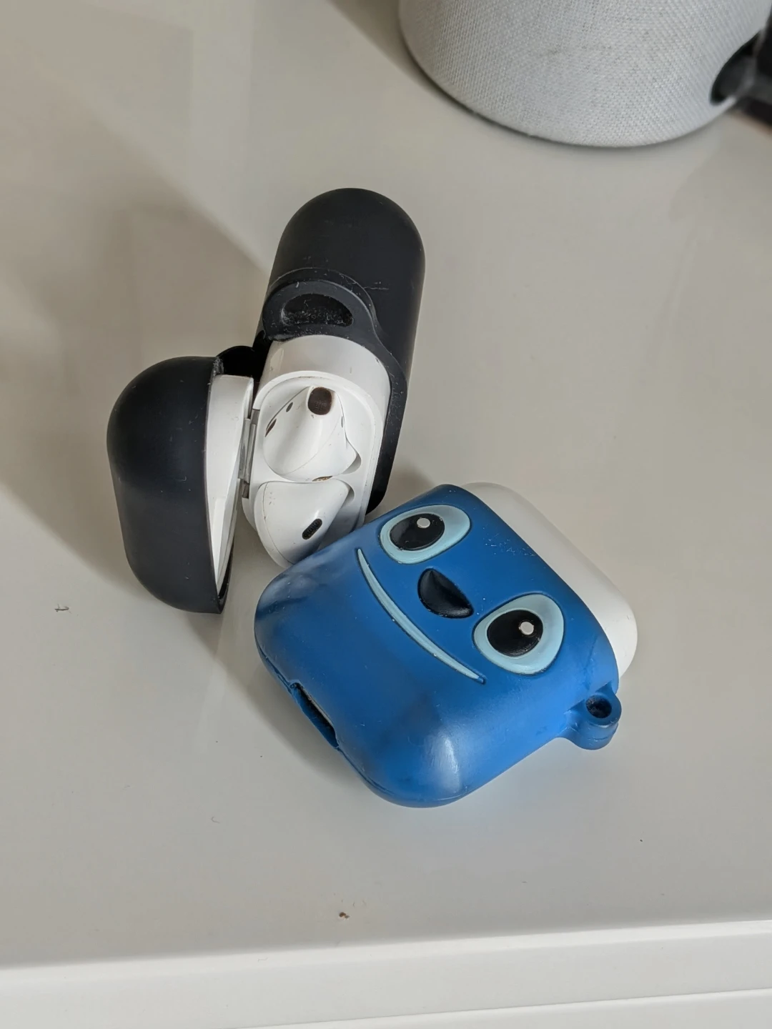 Authentic Apple AirPods 1st Gen (A1523) + Two Cases & Covers