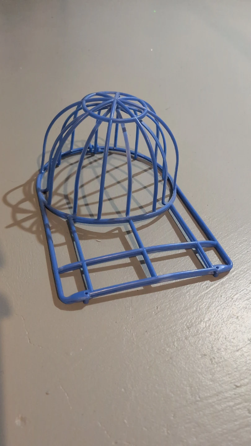 Blue plastic baseball cap brim shaper