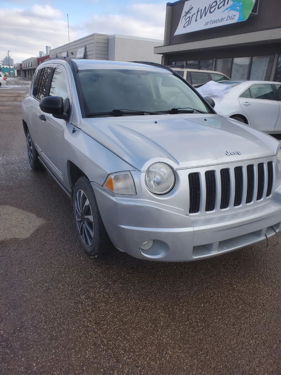 Silver Jeep Compass SUV - photo 3