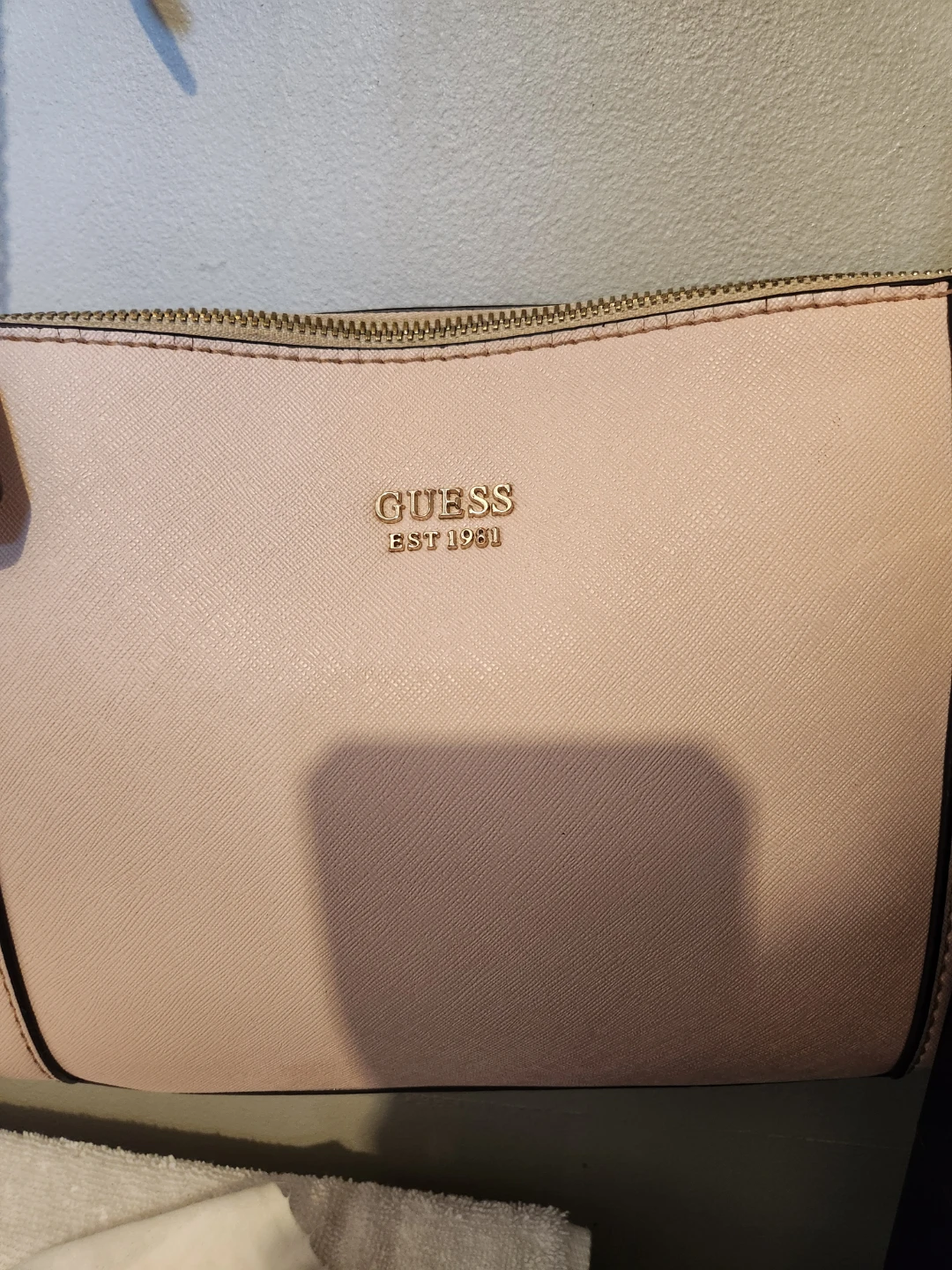 Pale pink guess purse