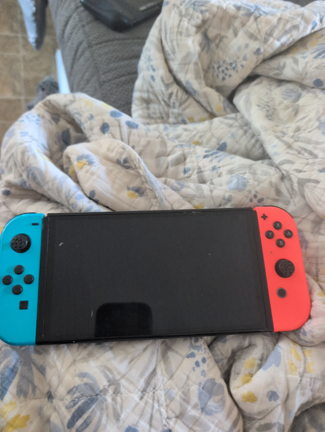 Nintendo Switch Console with Blue and Red Joy-Cons