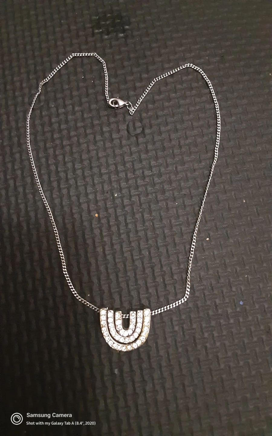 Silver necklace with faux diamond pendant