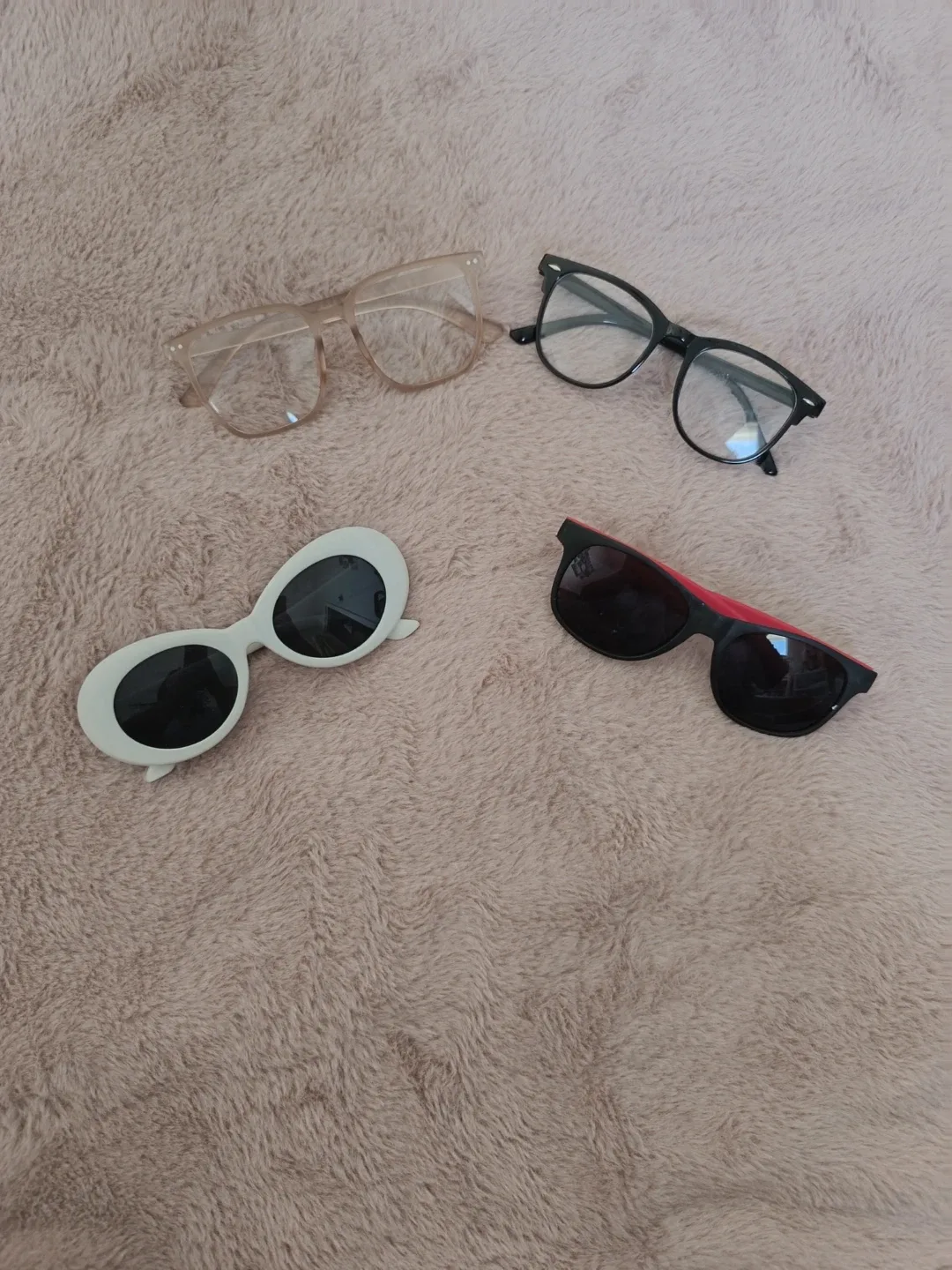 Four Pairs of Glasses and Sunglasses