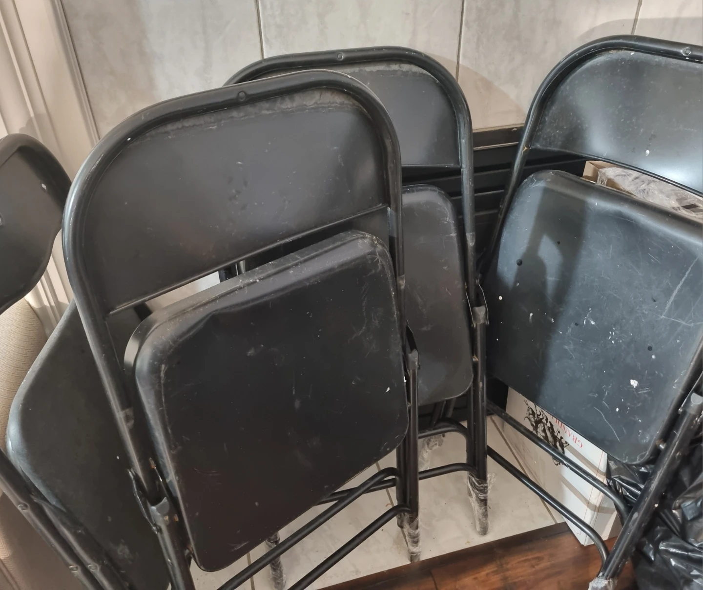 Must go tonight. 4 Black Metal Folding Chairs