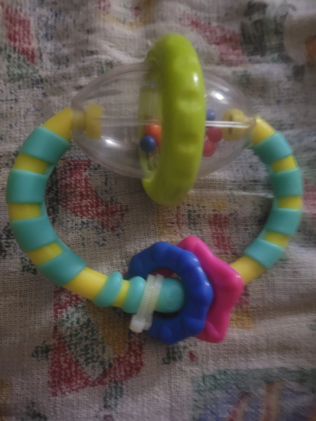 Bright Starts Grab and Spin Baby Rattle and Teether Toy.