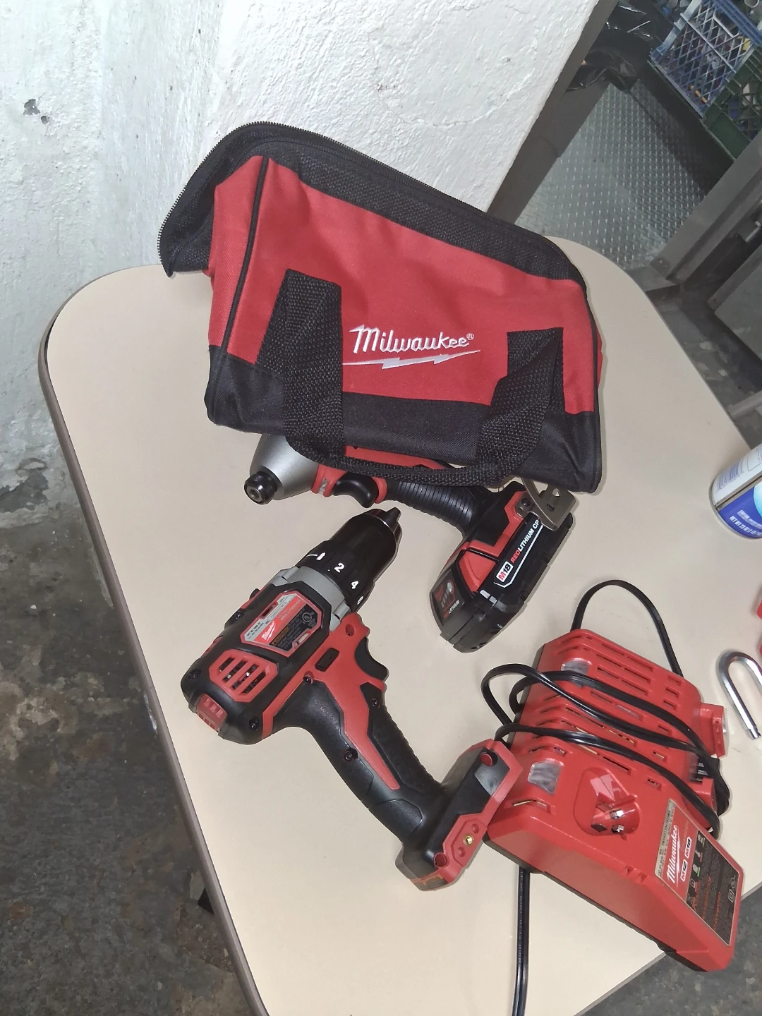 Milwaukee M18/M12 Cordless Drill and Impact Driver Combo Kit - photo 3