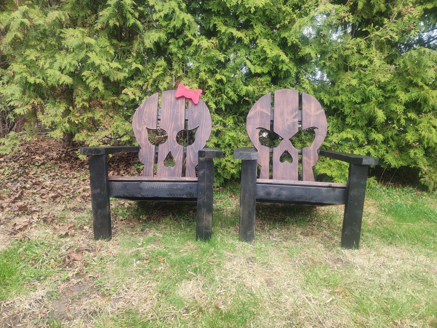 Pair of Wooden Skull Adirondack Chairs
