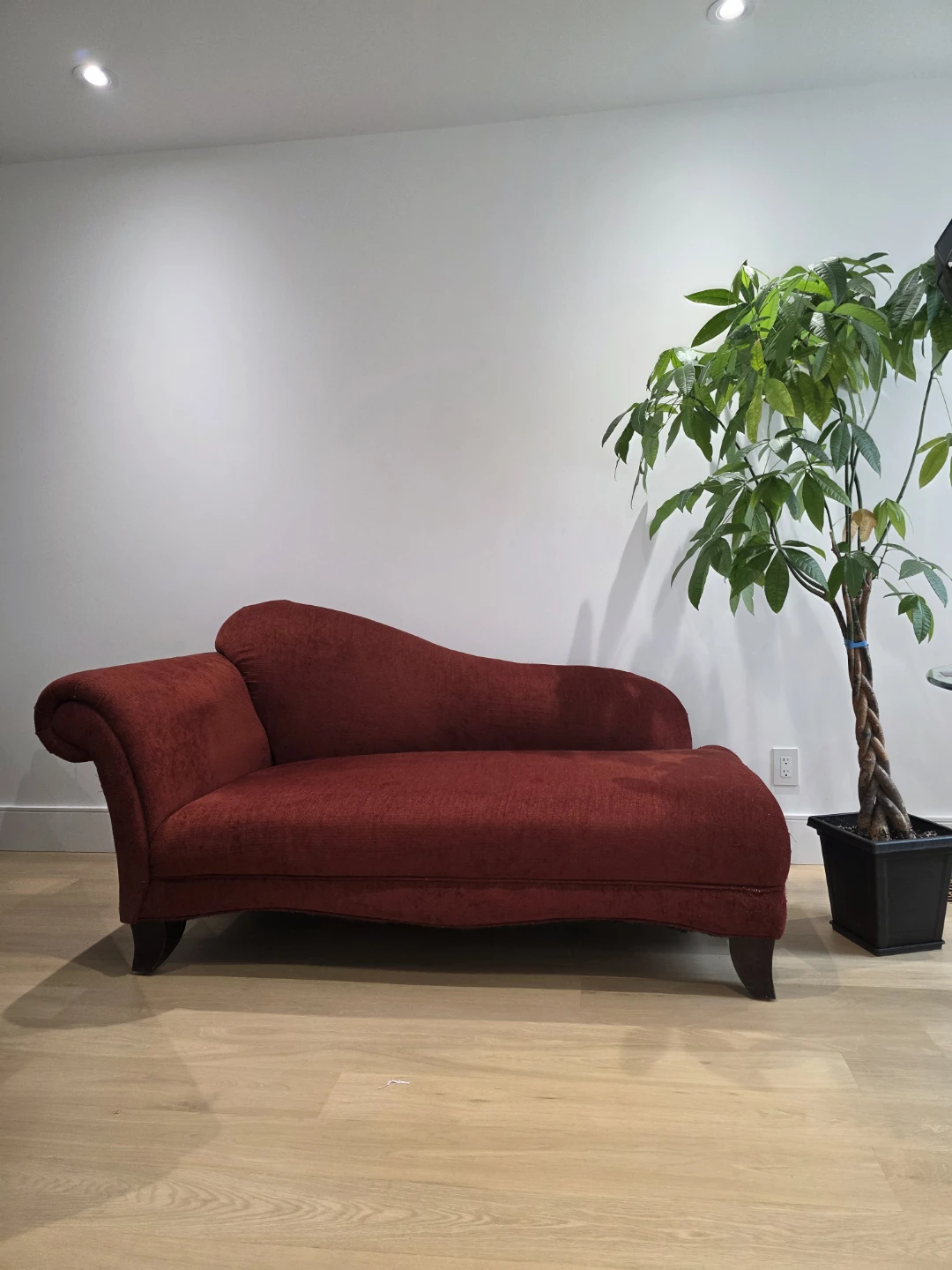 Burgundy Chaise Lounge with Decorative Pillow