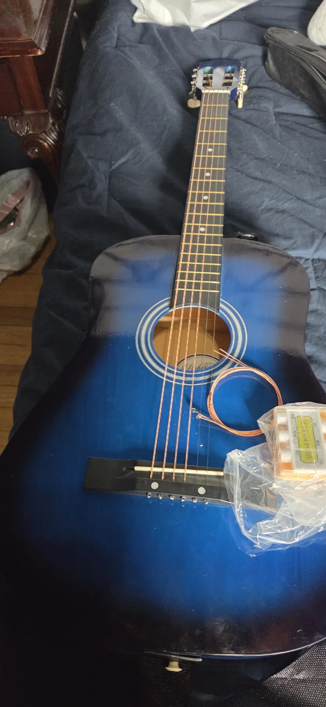Blue Acoustic Guitar with New Strings