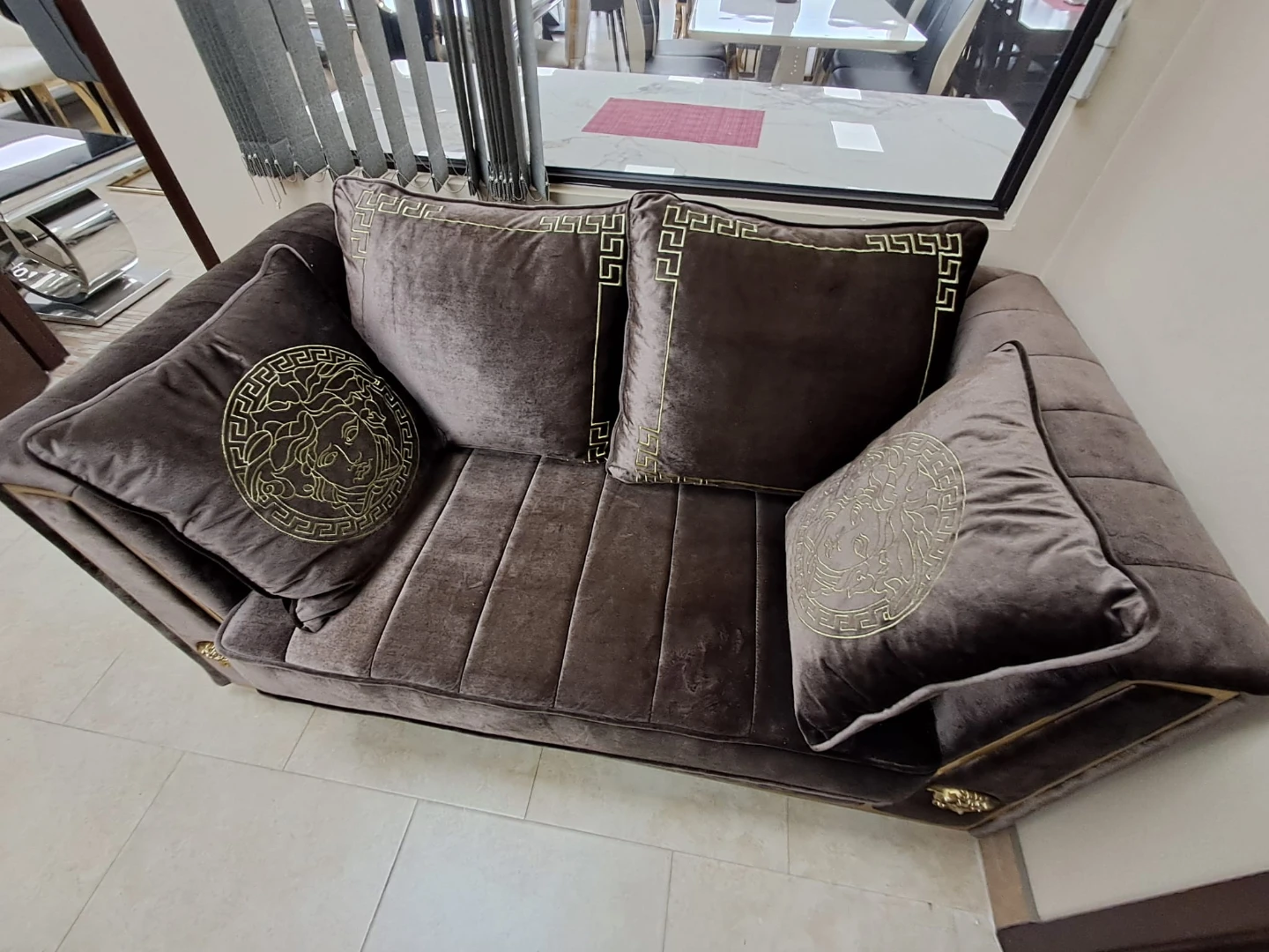 Velvet Sofa with Decorative Medusa Head Accents