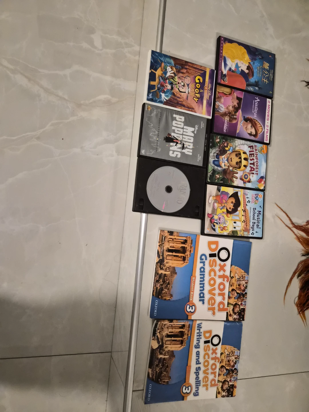 Assorted DVDs and Oxford Grammar Books