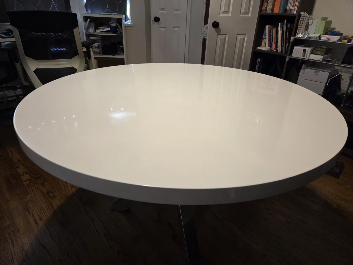 Round White Dining Table with Chrome Base from Moes Furniture