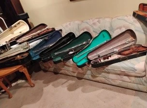 Set of 8 Violins and Cases
