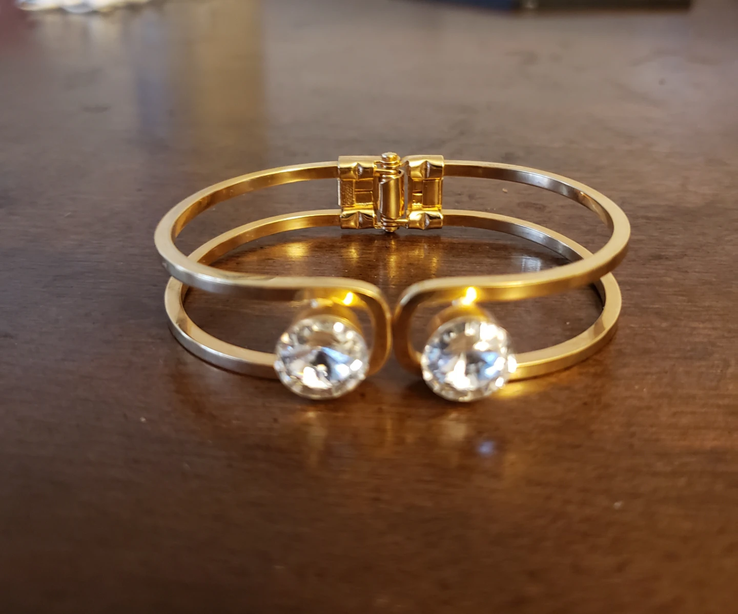 Gold Tone Cuff Bracelet with Two Clear Stones
