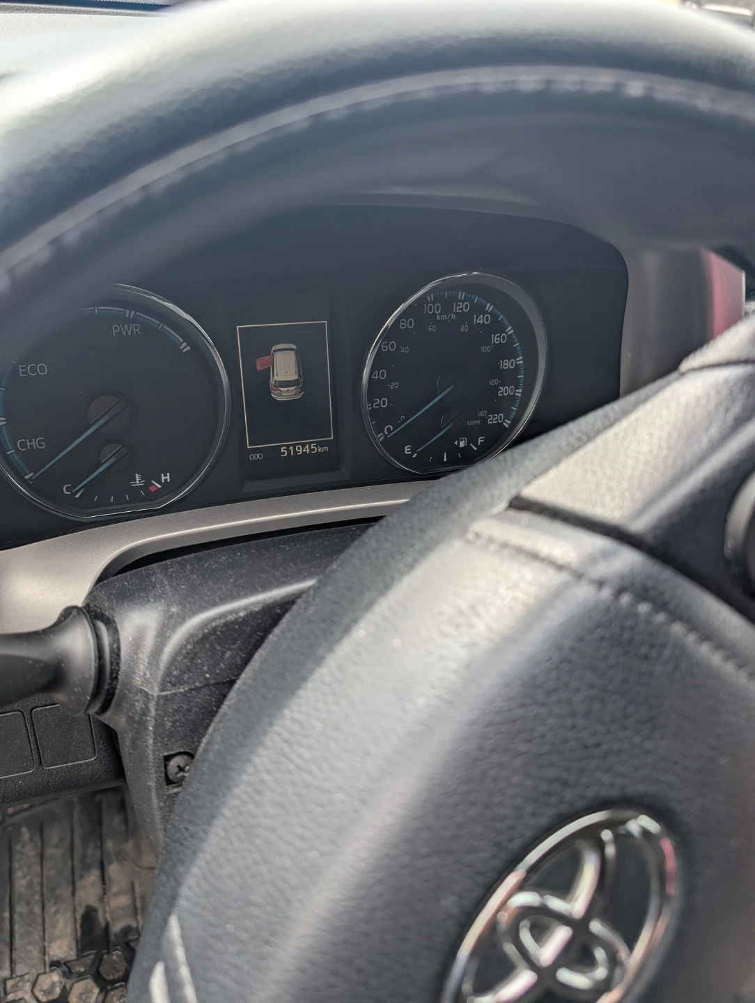 Silver Toyota RAV4 LE Hybrid SUV