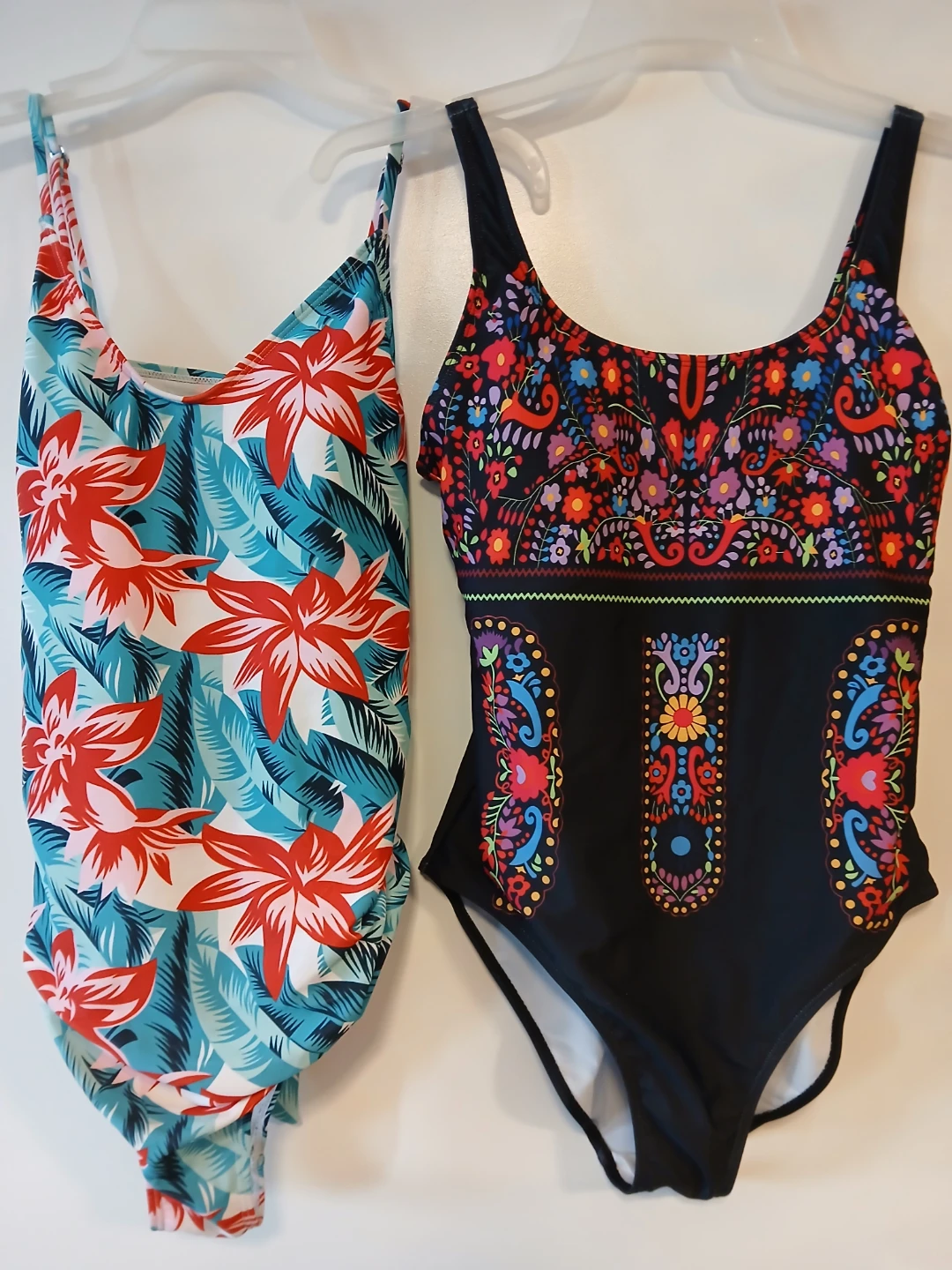 Two women's swimsuits - Size L. $12 EACH FIRM.
