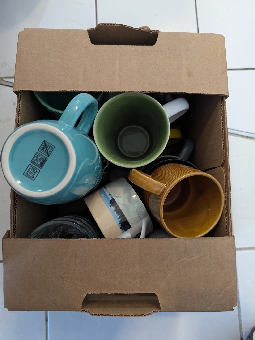 Box of mugs and glasses