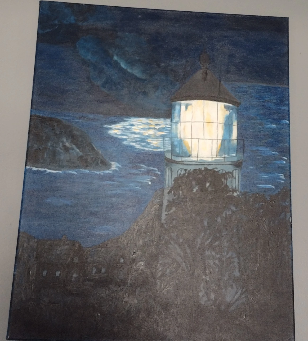 Painting of a Lighthouse at Night